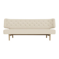Beige button-tufted sofa with a minimalist design and light wood legs, perfect for modern decor.