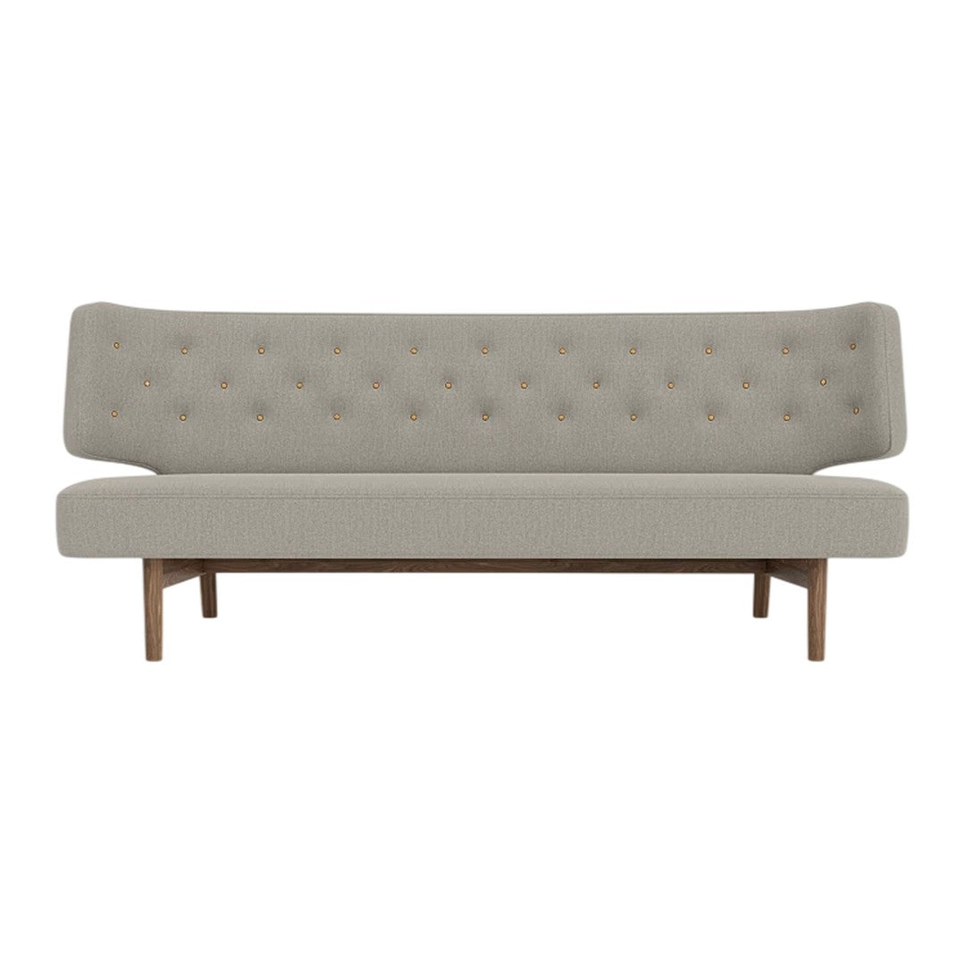 Light gray tufted sofa with a minimalist design and wooden legs, perfect for modern home decor.