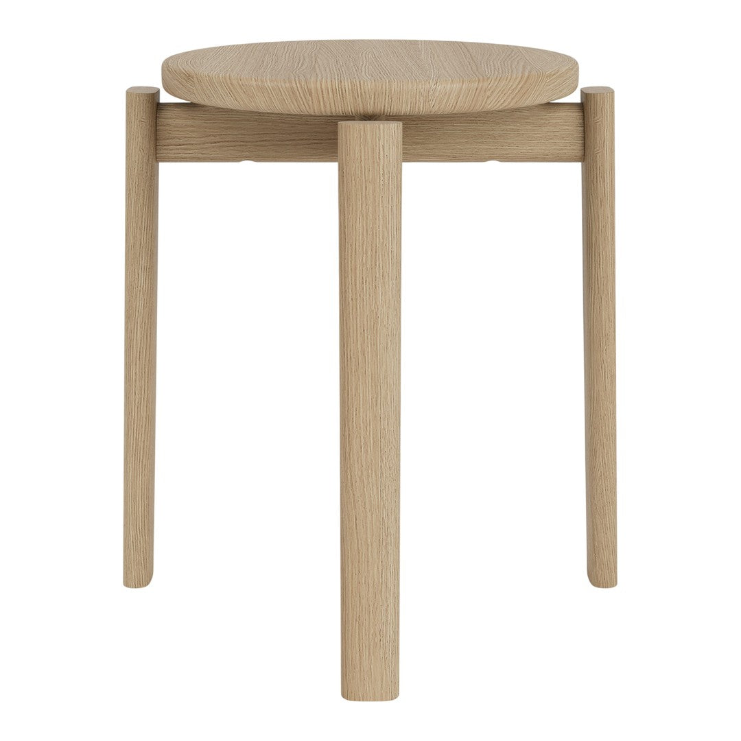 Natural oak stool with a smooth finish and minimalist design; features a round top and straight legs.