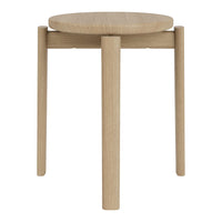 Natural oak stool with a smooth finish and minimalist design; features a round top and straight legs.