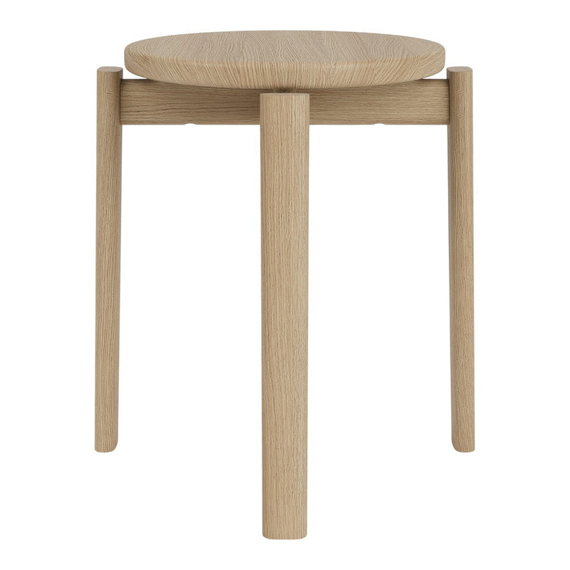 Natural oak stool with a smooth finish and minimalist design; features a round top and straight legs.