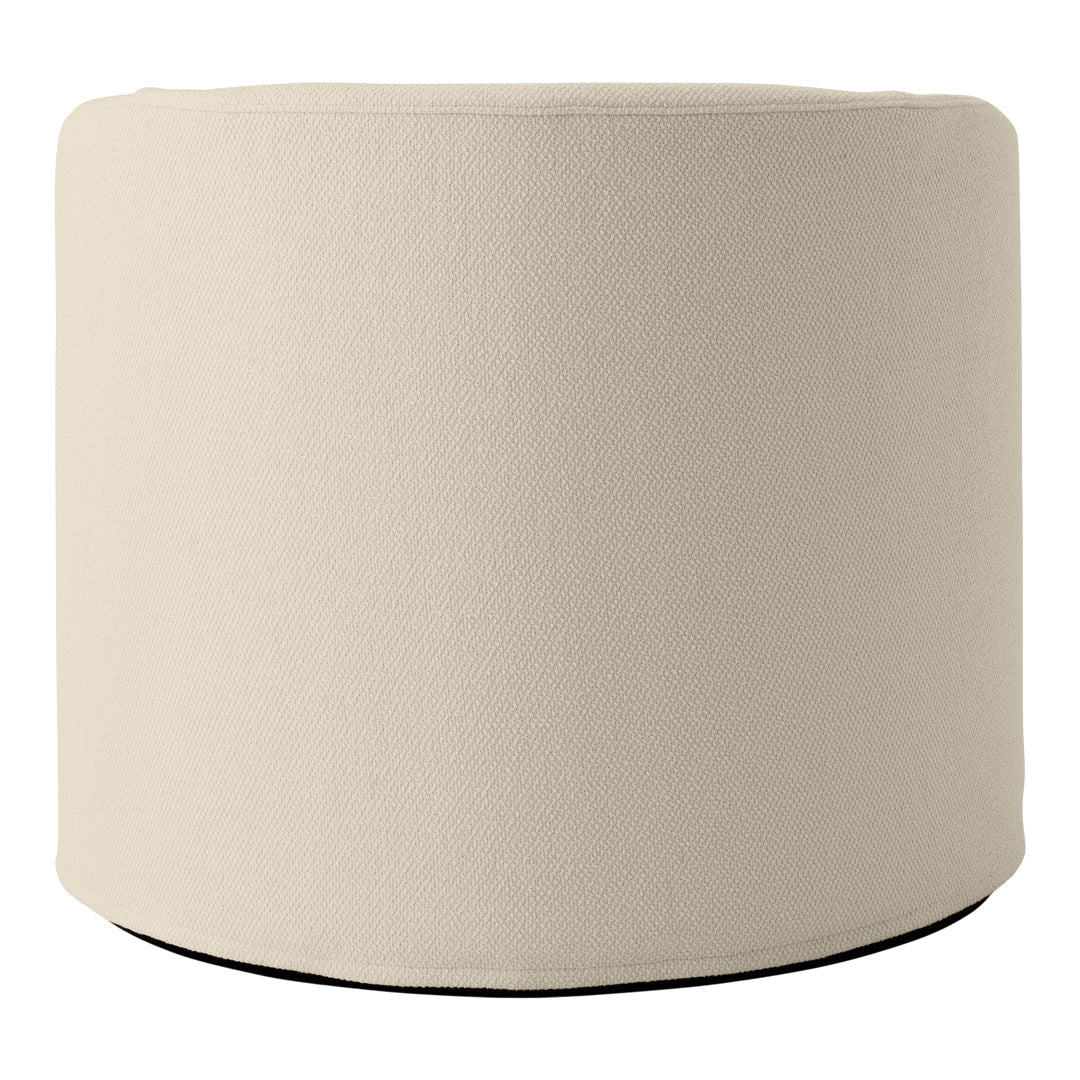 Beige textured pouf with a rounded shape and subtle pattern, perfect for modern décor accents.