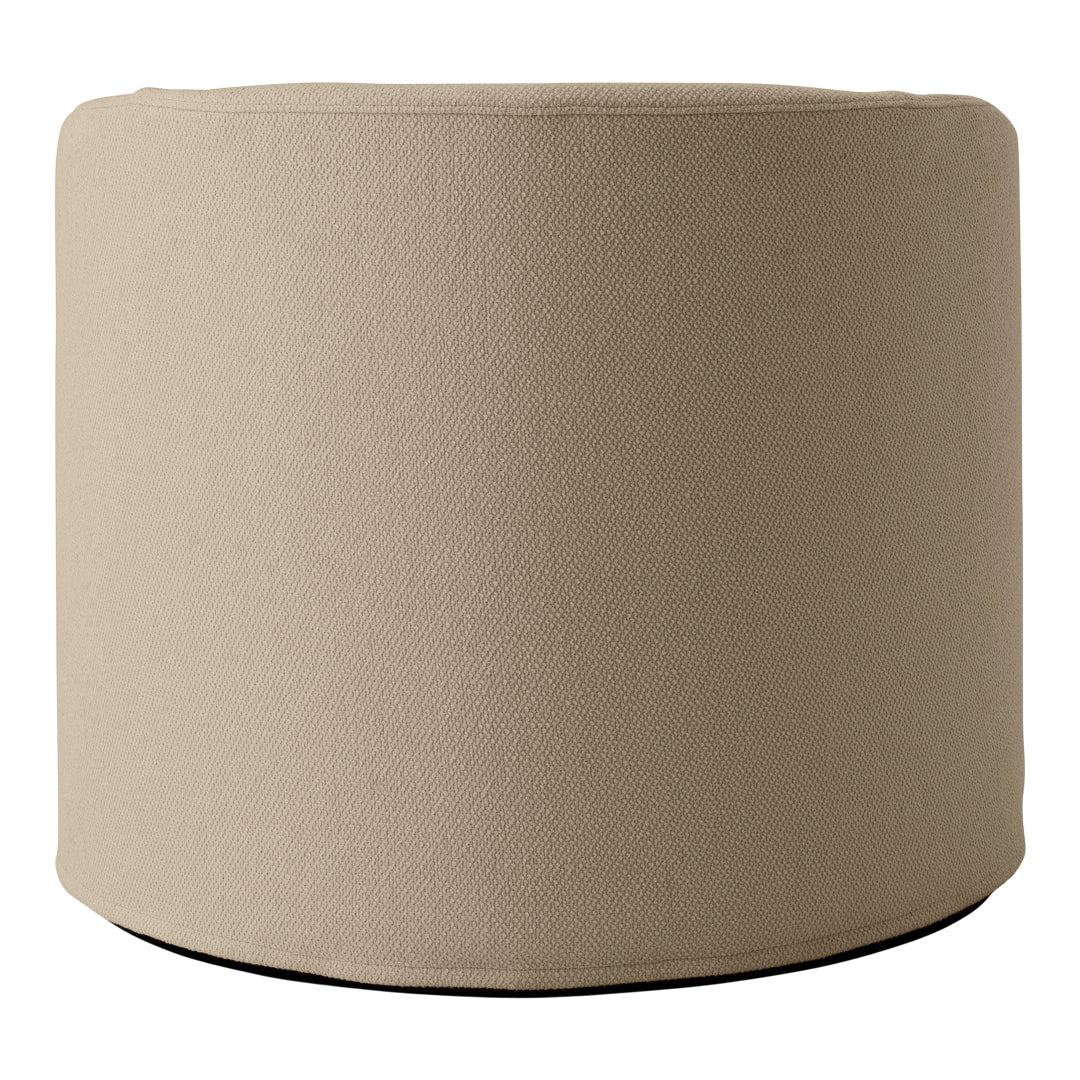 Beige textured fabric pouf with a smooth, rounded design, perfect for versatile home decor use.