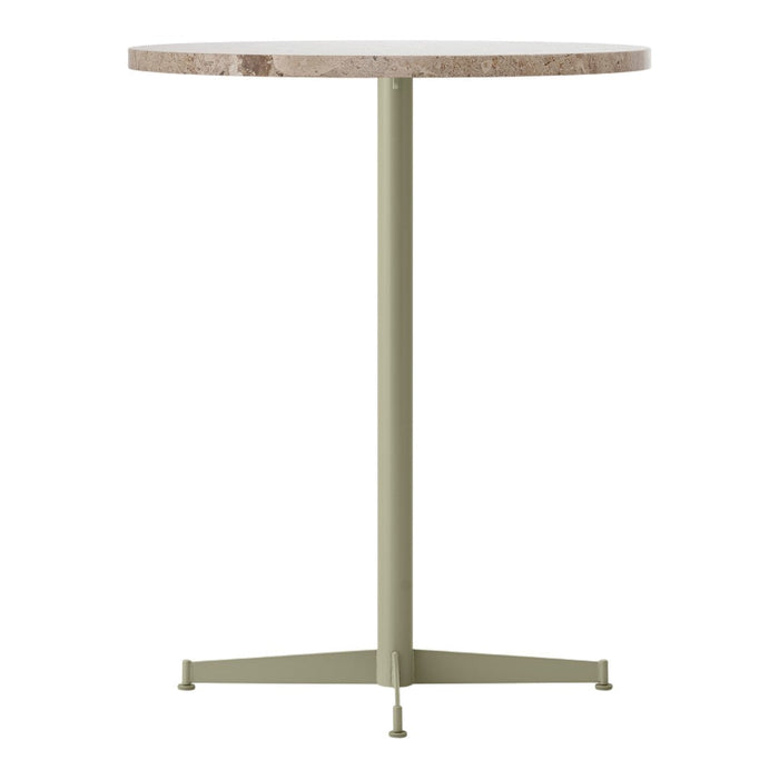 Round table with a speckled light beige top and a muted olive green metal base. Minimalist design, neutral colors.