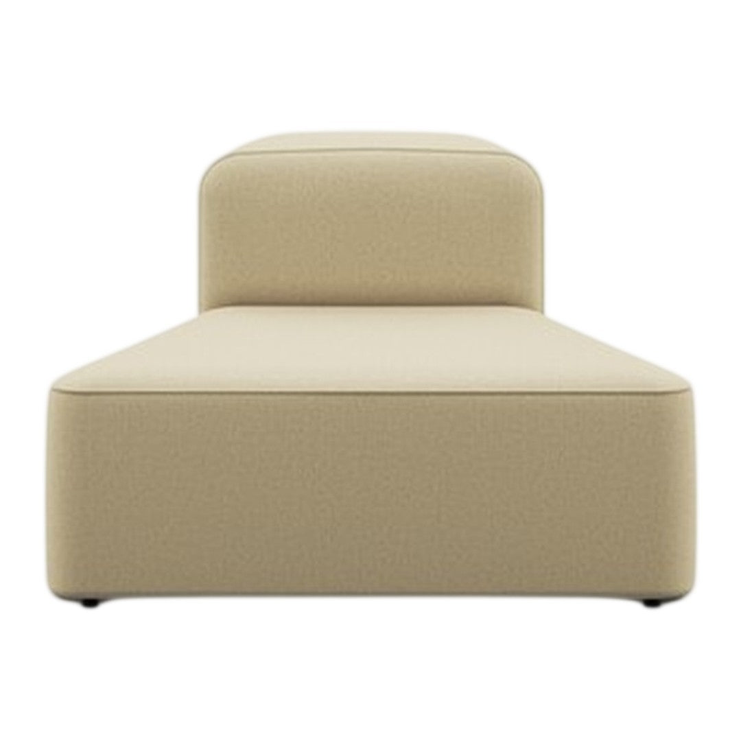 Beige modern chaise lounge with a smooth, textured fabric and minimalistic design. Ideal for contemporary decor.