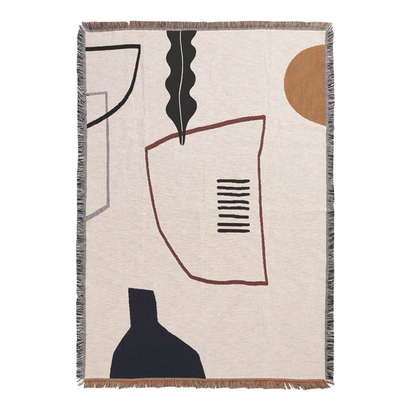Abstract woven blanket featuring beige, navy, brown, and black geometric patterns with fringe edges.
