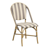 Striped chair in beige and brown wicker with a bamboo frame, perfect for indoor or outdoor settings.