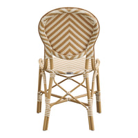 Light beige and cream woven chair with a chevron pattern and natural wooden frame, perfect for stylish seating.