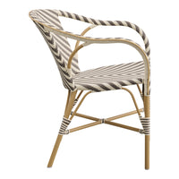 Striped chair in beige and brown tones, featuring a modern zigzag pattern on a natural frame. Perfect for stylish decor.