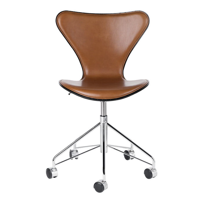 Brown leather chair with a sleek, modern design and chrome base, featuring a smooth, curved silhouette.
