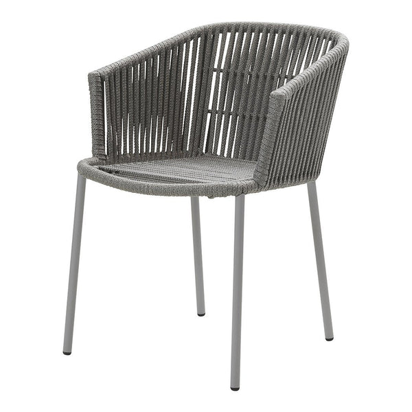 Gray woven chair with a modern cylindrical design and sleek metal legs, ideal for contemporary decor.