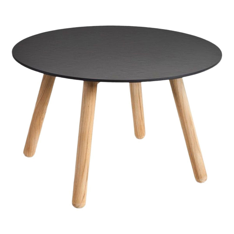 Round black tabletop with natural wood legs, sleek modern design perfect for contemporary decor.