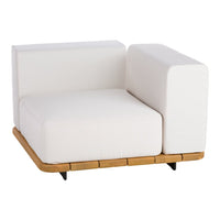 White modular sofa with clean lines and a natural wood base, featuring a minimalist, contemporary design.