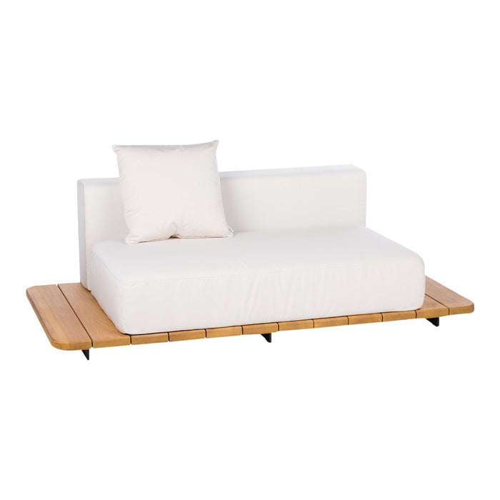 Minimalist white sofa with a wood platform and a matching cushion, showcasing a clean, modern design.