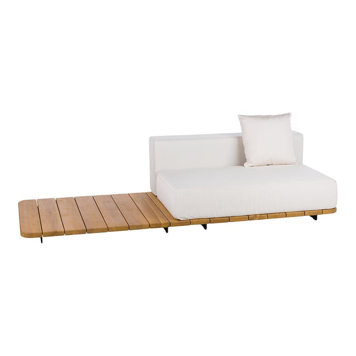 Modern white sofa with a natural wood platform and a soft beige pillow. Stylish minimalistic design and neutral colors.