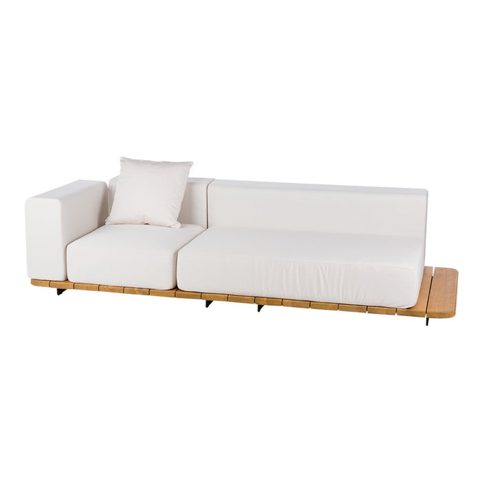 Modern white sofa with clean lines and a light wooden base, featuring a plush accent pillow.