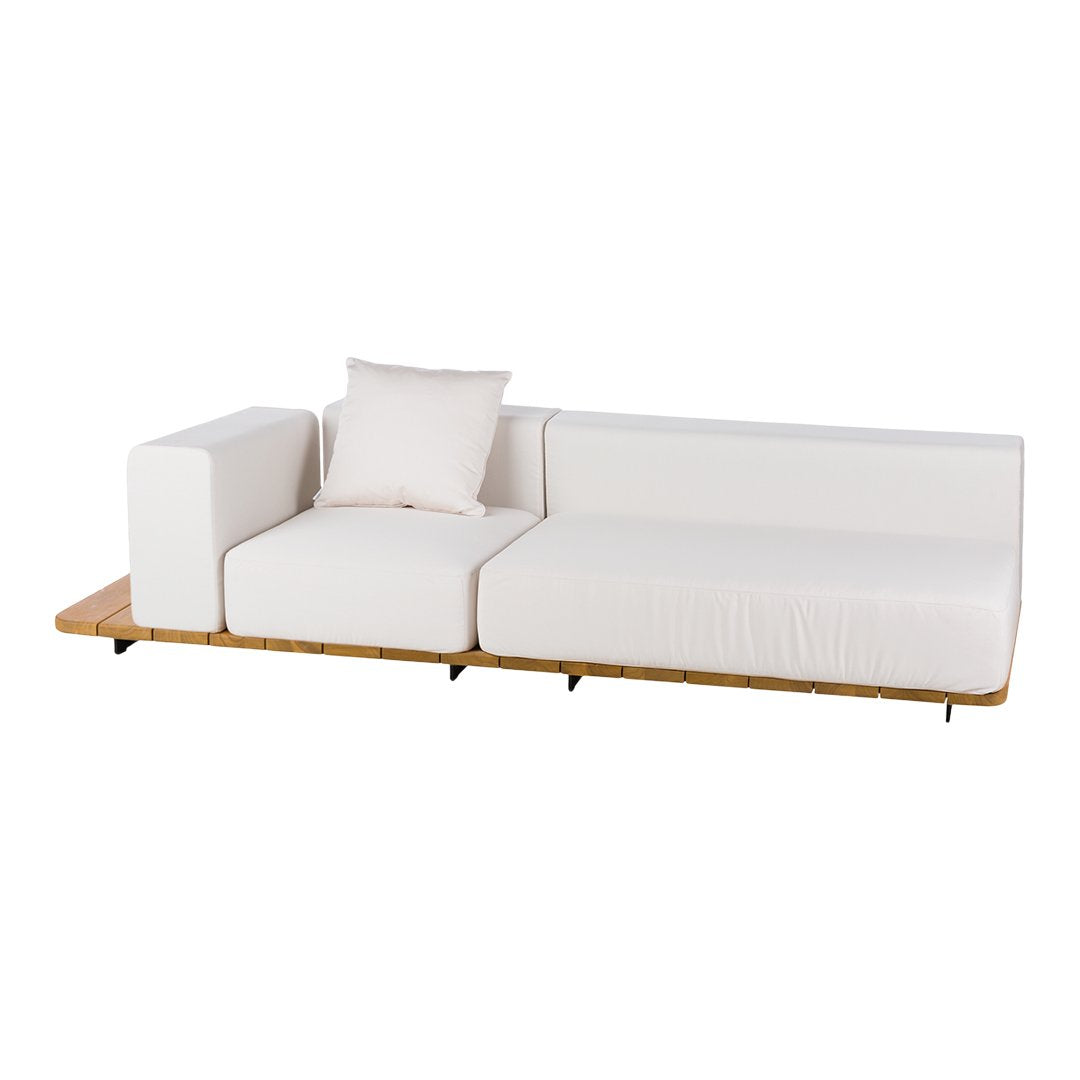 Modern white sectional sofa with a minimalist design and soft textured fabric, accented by a natural wood base.