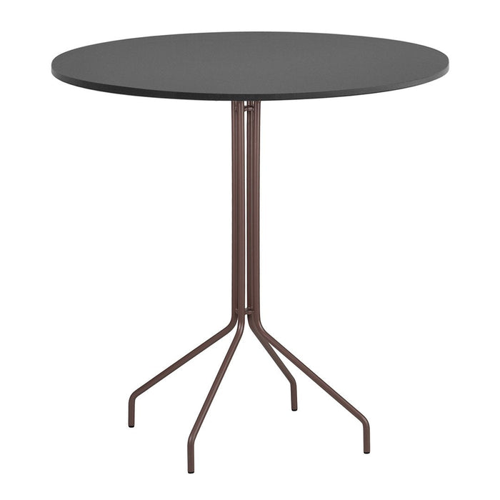 Round black tabletop with a brown, tripod-style metal base, perfect for modern decor.