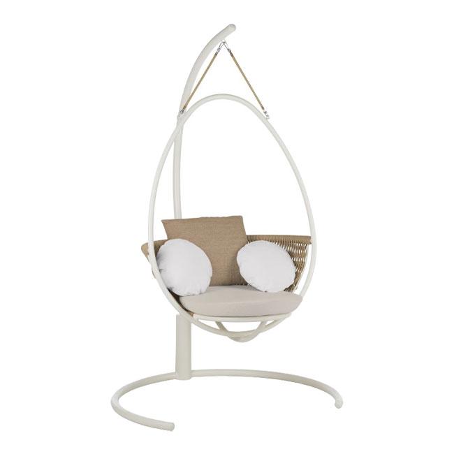 Egg-shaped hanging chair in white with beige cushions and soft round pillows. Modern, stylish design for indoor or outdoor use.