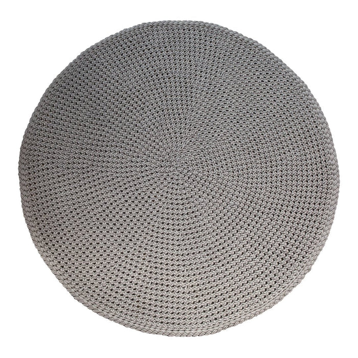 Round grey woven rug with a textured pattern, creating a cozy and modern look for any space.