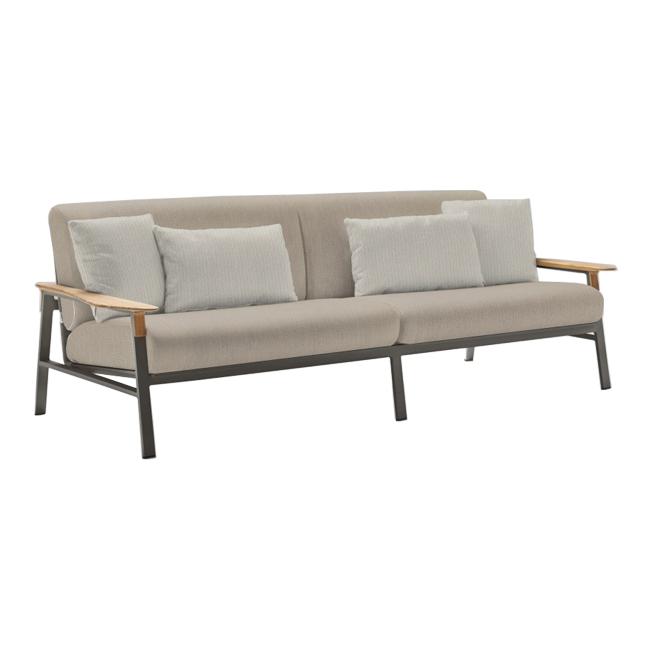 Light beige fabric sofa with gray accent pillows and wooden armrests, featuring a simple, modern design.