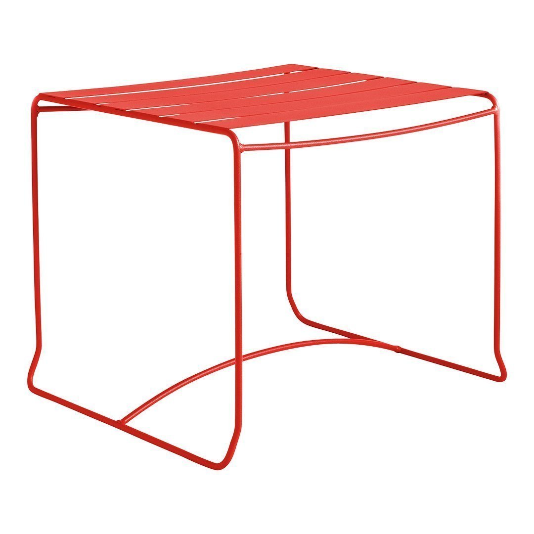 Red metal side table with a sleek, minimalist design and horizontal slat pattern. Ideal for modern decor.