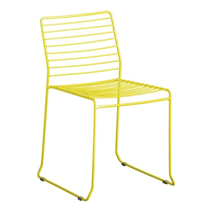 Bright yellow metal chair with sleek striped design, perfect for modern decor and outdoor seating.