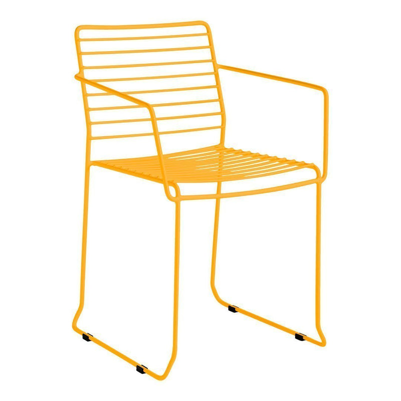 Bright orange metal chair with a modern striped pattern, perfect for outdoor or indoor settings.