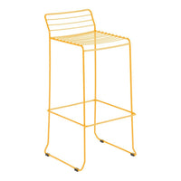 Bright yellow bar stool with a sleek, modern design featuring horizontal striped patterns. Ideal for contemporary spaces.