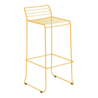 Yellow metal bar stool with sleek, modern lines and a minimalist design. Ideal for contemporary spaces.