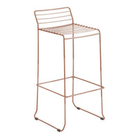 Copper-colored bar stool with a minimalist design and striped seat pattern, ideal for modern decor.