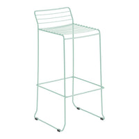 Light mint green bar stool with minimalist wire design and horizontal slat pattern. Perfect for modern decor.