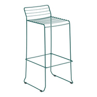 Teal metal bar stool with sleek horizontal slats and minimalist design. Perfect for modern decor.