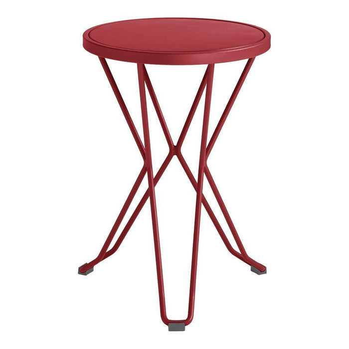Red round side table with geometric metal legs and a smooth finish. Ideal for modern decor.