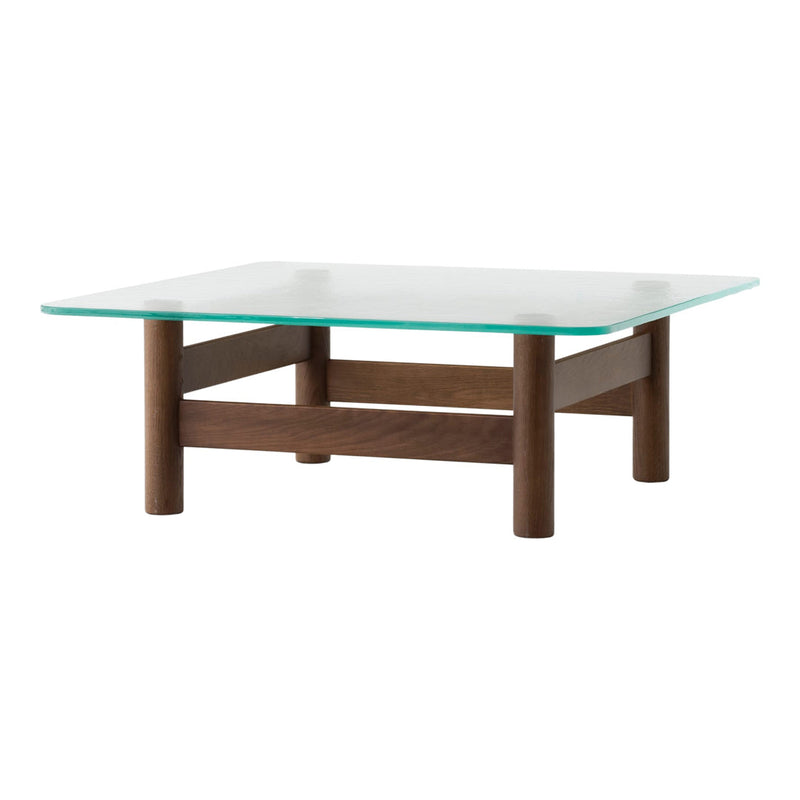Wooden coffee table with dark brown legs and a clear glass top, featuring a sleek, minimalist design.