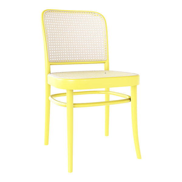 Bright yellow chair with a woven cane back and a solid seat for a cheerful, modern look. Ideal for vibrant decor.