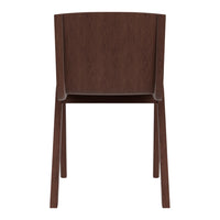 Dark brown wooden chair with a smooth finish and minimalist design, highlighting its natural texture.