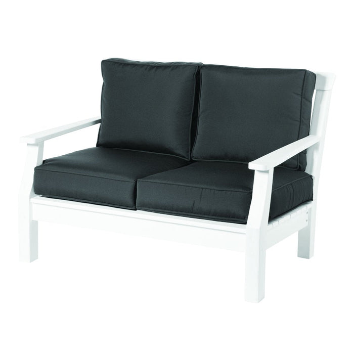 Black cushion loveseat with a sleek white wooden frame, ideal for modern outdoor decor.