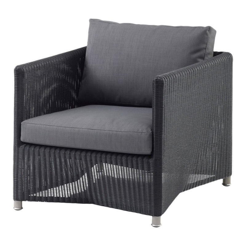 Gray wicker armchair with a matching cushion, featuring clean lines and a modern design. Perfect for contemporary spaces.