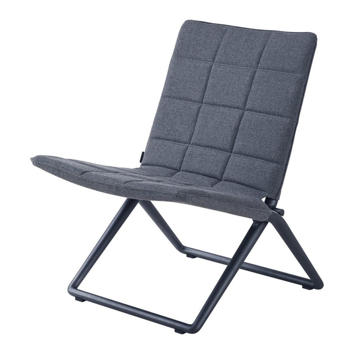 Gray upholstered chair with a quilted pattern and a minimalist metal frame for modern decor.