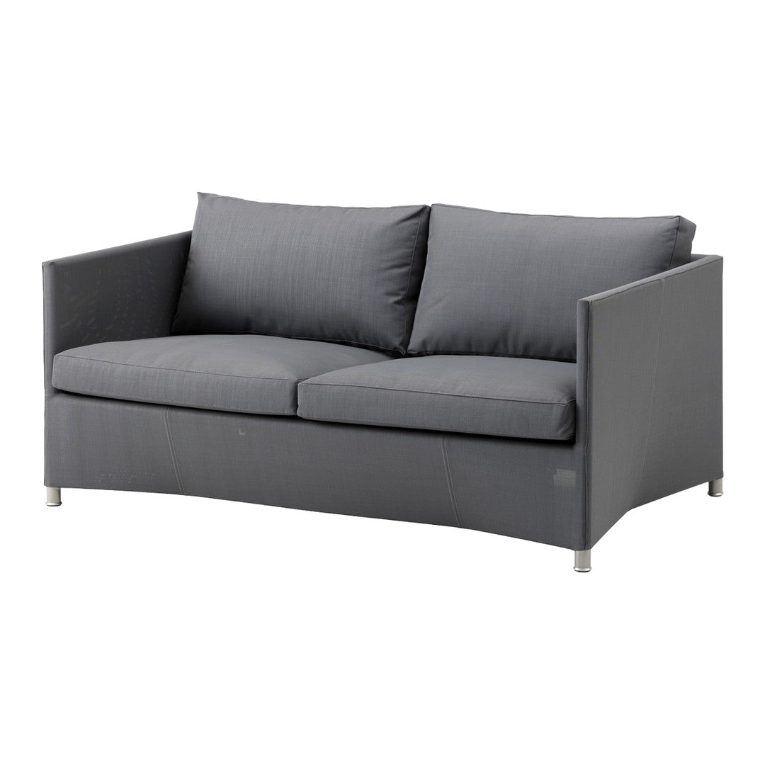 Gray two-seater sofa with a smooth fabric finish and minimalist design, featuring plush cushions and sleek metal legs.