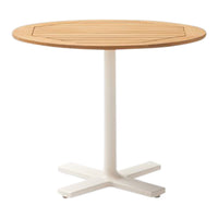 Round wooden table with a natural light brown finish and a sleek white base. Perfect for modern outdoor or indoor settings.