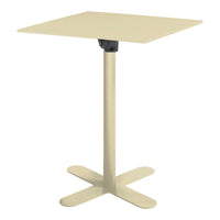 "Square cream-colored table with a sleek, minimalist design and a sturdy black base."