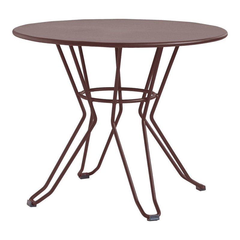 Round brown metal dining table with a minimalist wireframe design and a sleek, smooth surface. Perfect for modern decor.