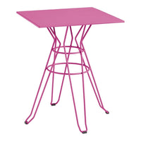 Pink metal side table with a geometric wire design and a minimalist square top. Perfect for modern decor.