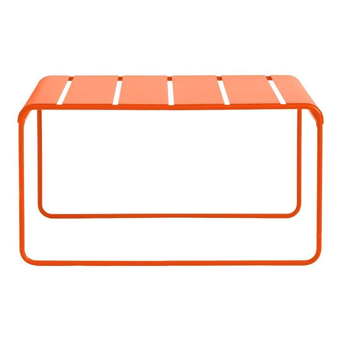 Bright orange metal coffee table with sleek slatted design and minimalist frame. Perfect for modern spaces.