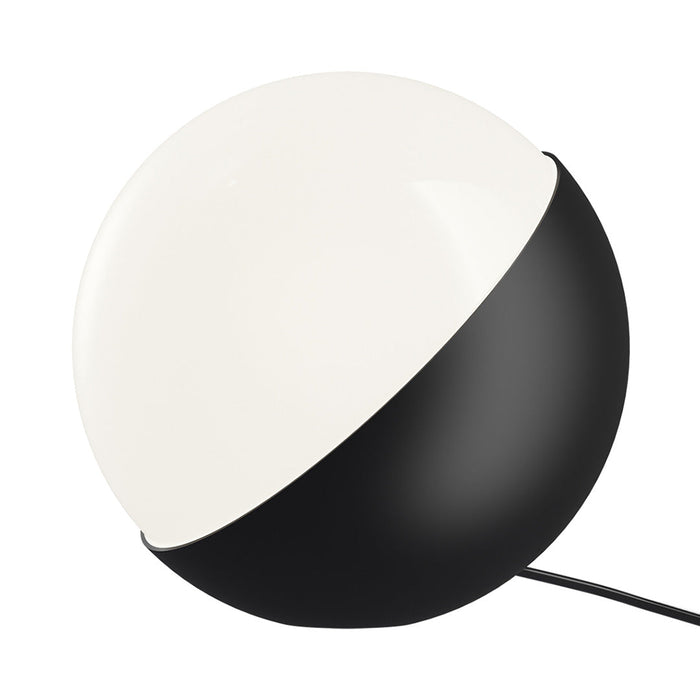 Black and white half-sphere lamp, featuring a sleek minimalist design, perfect for modern decor.