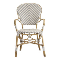 Bamboo chair with a chevron-patterned, cream and gray woven seat and backrest, featuring white detailing.