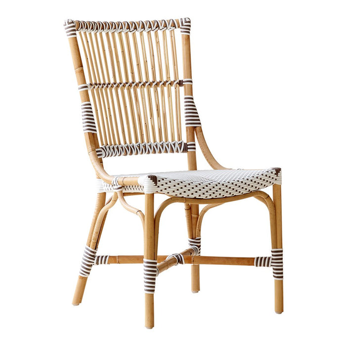 Rattan chair with natural bamboo finish and white striped weave detail, adding a stylish touch to any space.
