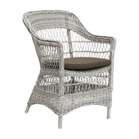 Light gray wicker chair with a woven pattern and dark brown cushioned seat for stylish comfort.
